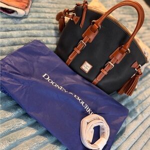 Dooney & Bourke Black Pebbled Leather Satchel with Brown Trim and Tassel